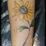 Girassol estilizado tattoo